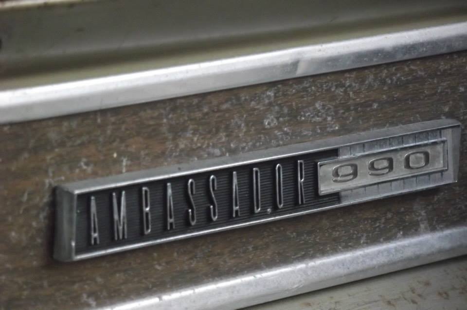 AMBASSADOR 990 badge on textured metal trim