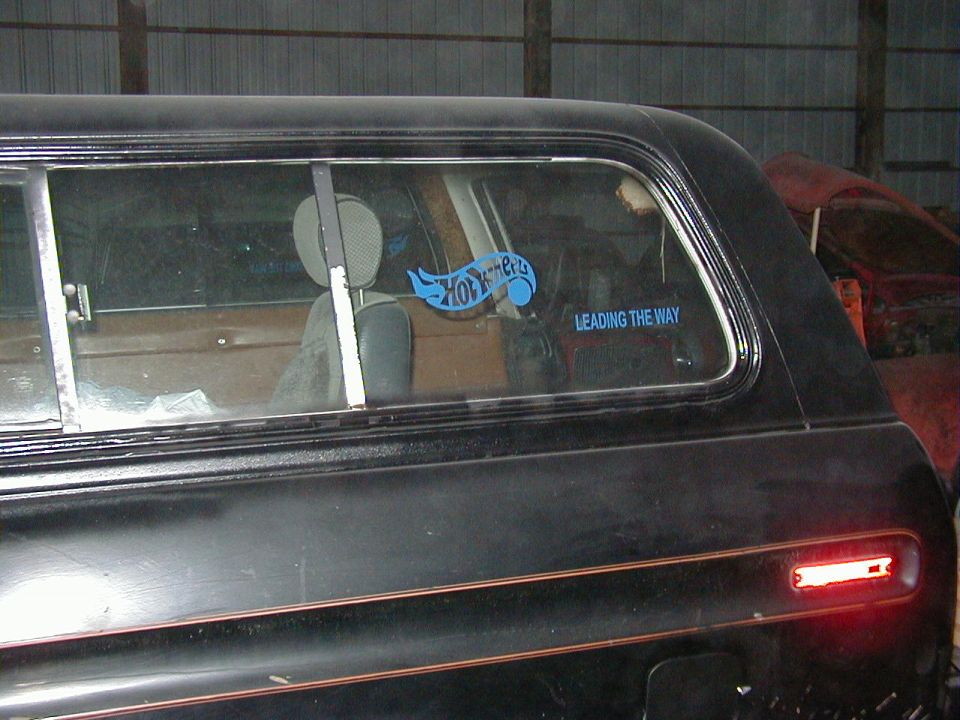 Hotwheels sticker on window