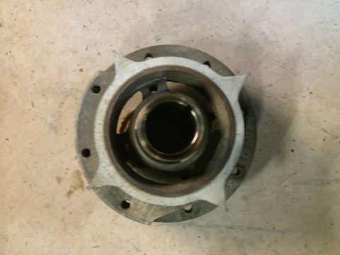 1996 Ford Bronco - A close-up view of a supercharger pulley hub, showing its metallic construction and mounting points.