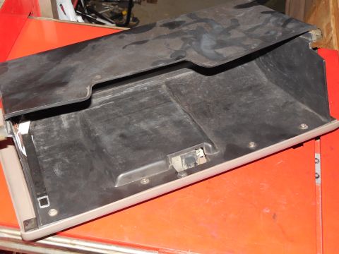 1983 Ford Bronco - The '92-97 non-locking glove box is very different from the locking. This one has a black box screwed to the colored front panel, with the…
