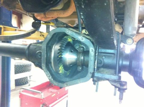 1988 Ford Bronco - Close-up of an open differential housing, revealing internal gears and lubrication.