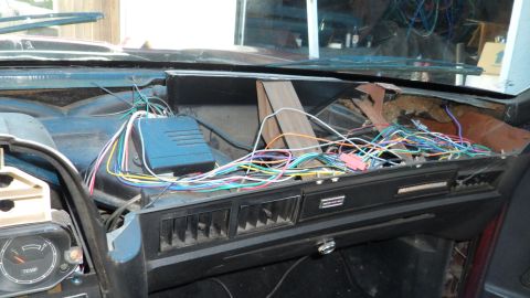 1972 Ford Ranchero - Exposed wiring and an electronic module are visible in the car's dashboard area.