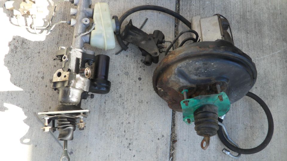Brake master cylinder and brake booster assembly on concrete