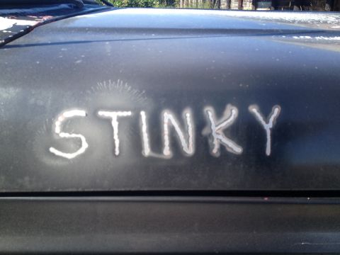 1978 Ford Bronco - The word STINKY is welded onto the hood of a vehicle.