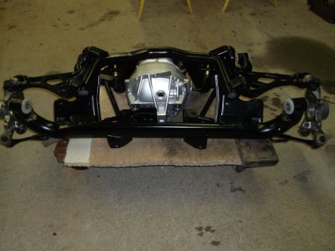1967 Ford Mustang - Rear axle assembly with differential and suspension components, likely for a classic car.