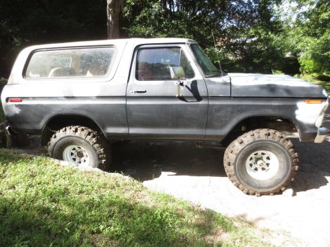1978 Ford Bronco - This 1978 Ford Bronco is shown in a side profile, appearing to be prepped for paint and modified for off-road use.