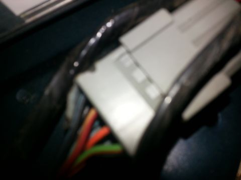 1994 Ford Bronco - Close-up of a vehicle's electrical connector and wiring harness.