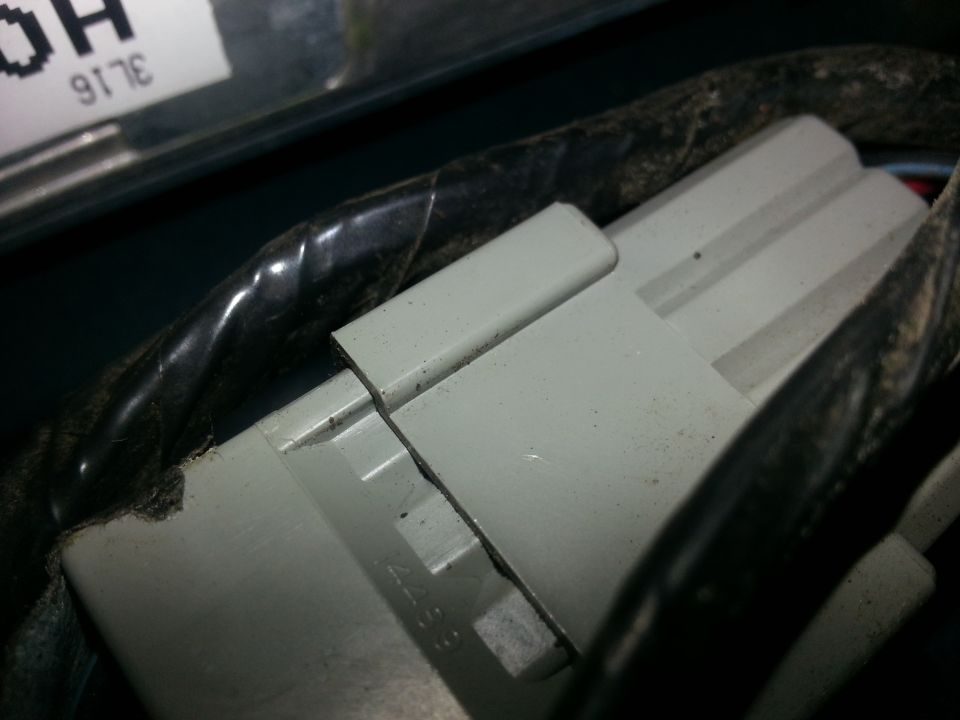 Gray electrical connector with black wiring