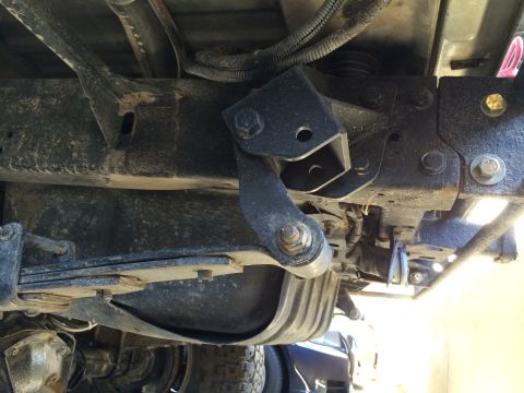 1995 Ford Bronco - Undercarriage view showing leaf springs, frame, and suspension components. No year-specific details are visible.