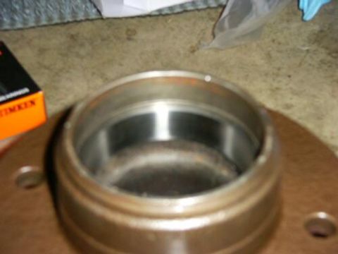 1994 Ford Bronco - A wheel hub assembly is shown with a box of Timken parts nearby.