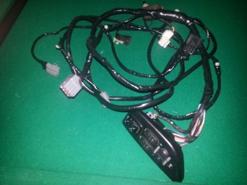 1994 Ford Bronco - Door wiring harness assembly with window and door lock controls, likely for a Ford vehicle.