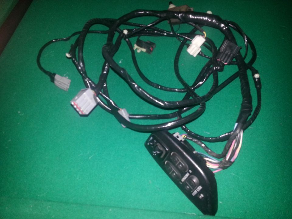 Door wiring harness with window and door lock controls