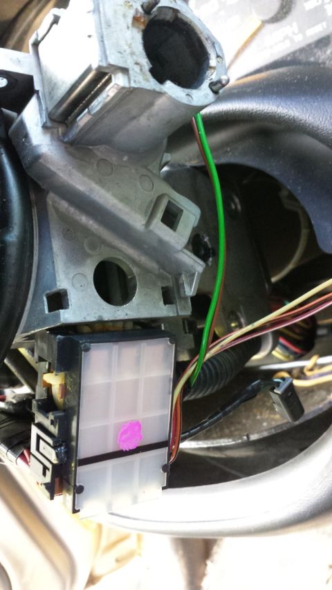 2000 GMC Jimmy - Wiring and electrical components visible around the steering column of a vehicle.