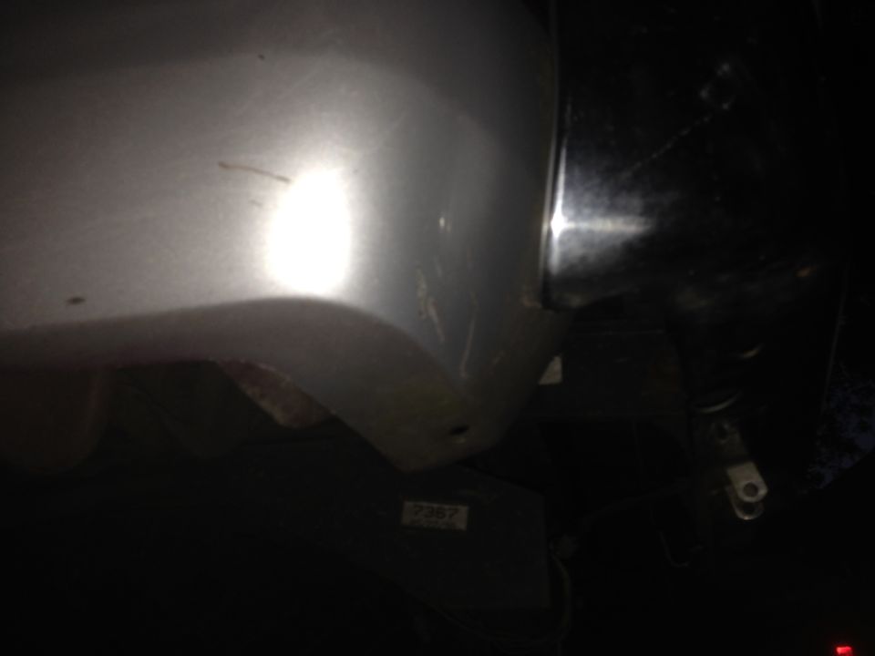 Silver truck fender and headlight detail. Visible text '2367'