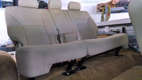 1979 Ford Bronco - Rear seating components are visible, showing the fabric and mounting hardware.