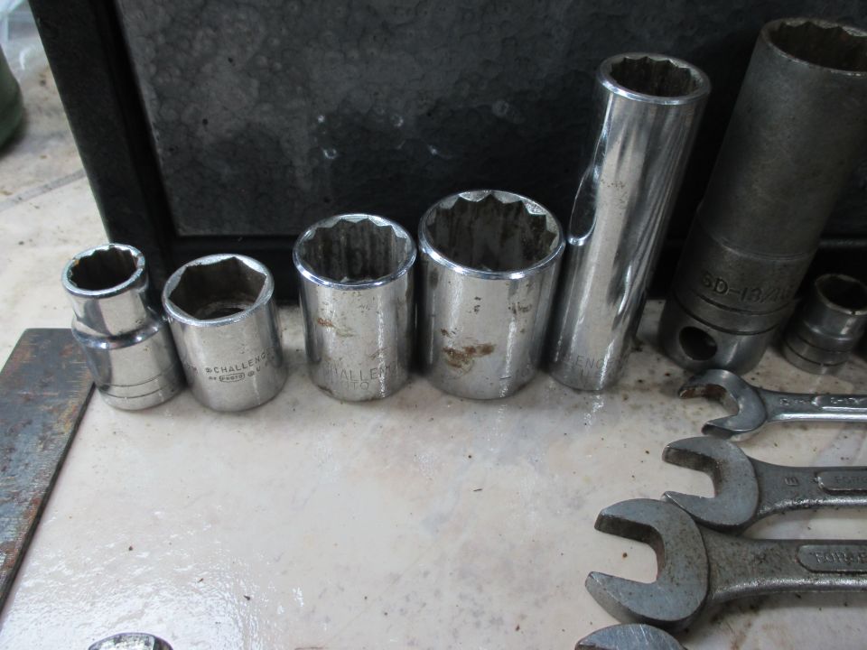 Socket set and wrenches on a surface
