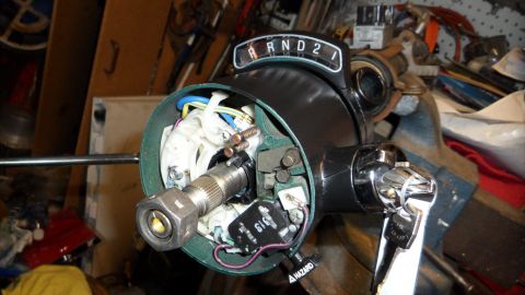 1972 Ford Ranchero - Close-up of a disassembled steering column, revealing the gear selector indicator and internal wiring.