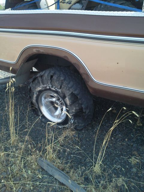 1979 Ford F-150 - The rear tire on this 1979 Ford F-150 is completely flat.