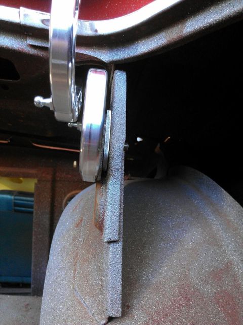 1964 Ford Fairlane - A custom brake caliper bracket is attached to the suspension, showing a close-up mechanical detail.