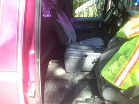 1992 Ford F-150 - Interior view of a 1992 Ford F-150, highlighting the seats and console area.