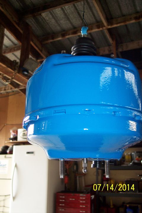 1978 Ford Bronco - Blue brake booster hanging in a garage, dated 07/14/2014.