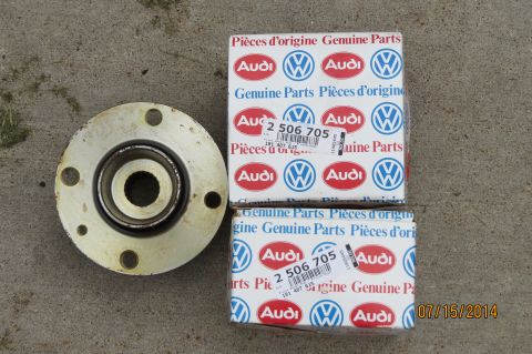 1985 Volkswagen Jetta - Two boxes of genuine Volkswagen and Audi parts are shown next to a wheel bearing. The part number 2 506 705 is visible on the boxes.