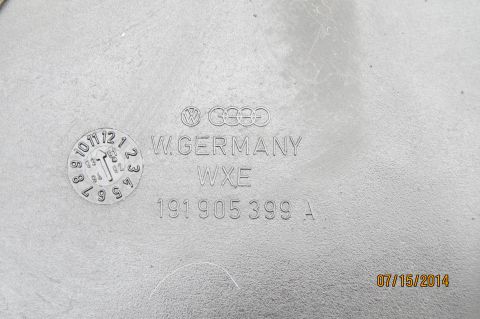 1985 Volkswagen Jetta - Close-up of a stamped part showing manufacturer logos and identification numbers.