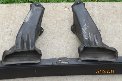 1985 Volkswagen Jetta - Two black plastic air intake ducts and a black trim piece are shown, with a date stamp and website visible in the lower right corner.
