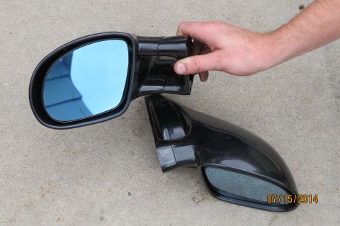 1985 Volkswagen Jetta - Pair of aftermarket side mirrors with blue tinted glass shown on concrete.