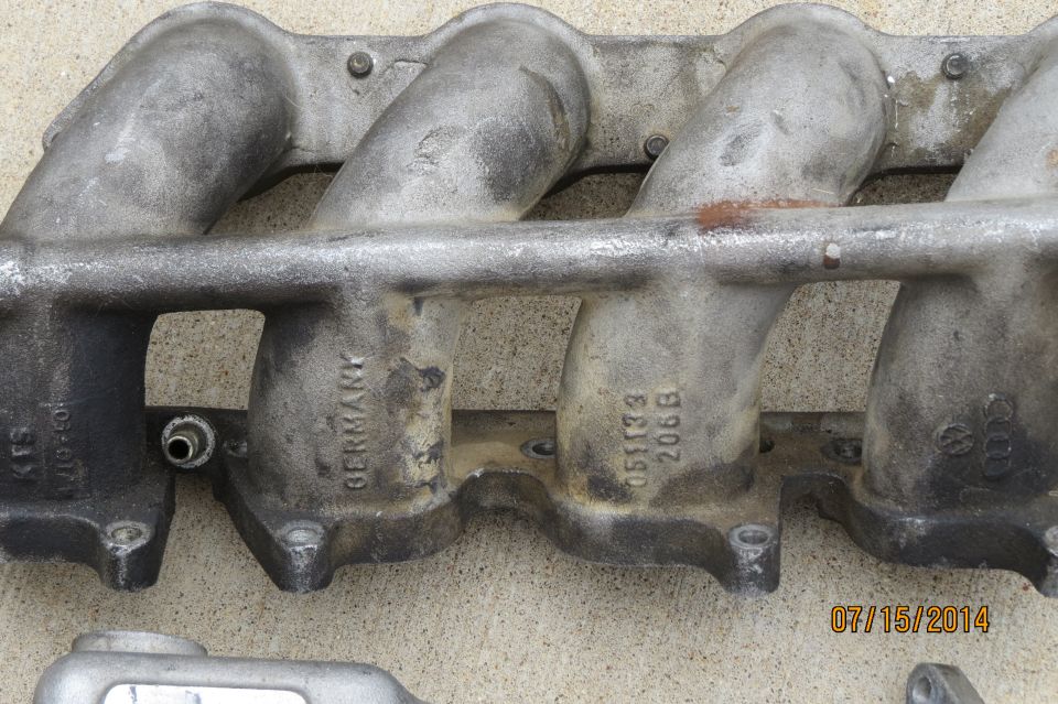 Aluminum intake manifold with 'GERMANY' and '051133 206B' cast into it