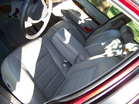 1999 Mercury Grand Marquis - The interior of a 1998 Mercury Grand Marquis features tan leather seats and wood trim.
