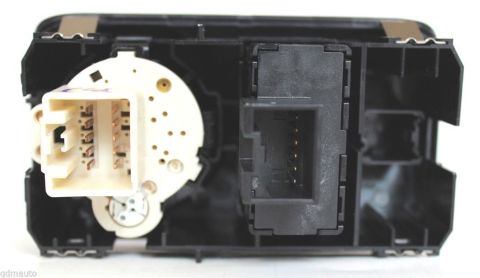 1996 Ford Bronco - This is a close-up view of the rear of an automotive electrical switch assembly, showing its connectors.