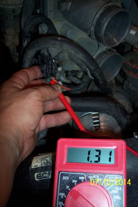 1990 Ford Bronco - Multimeter shows 1.31 volts at an engine electrical connector.