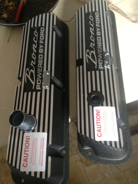 1979 Ford Bronco - Pair of aftermarket Ford Bronco valve covers with installation caution labels.