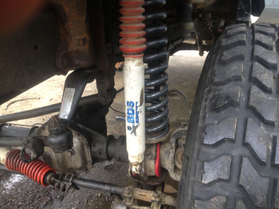 Close-up of off-road suspension with BDS shock and large tire