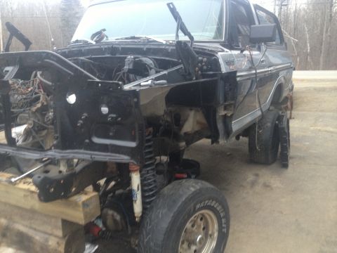 1979 Ford Bronco front end removed, showing engine bay and suspension