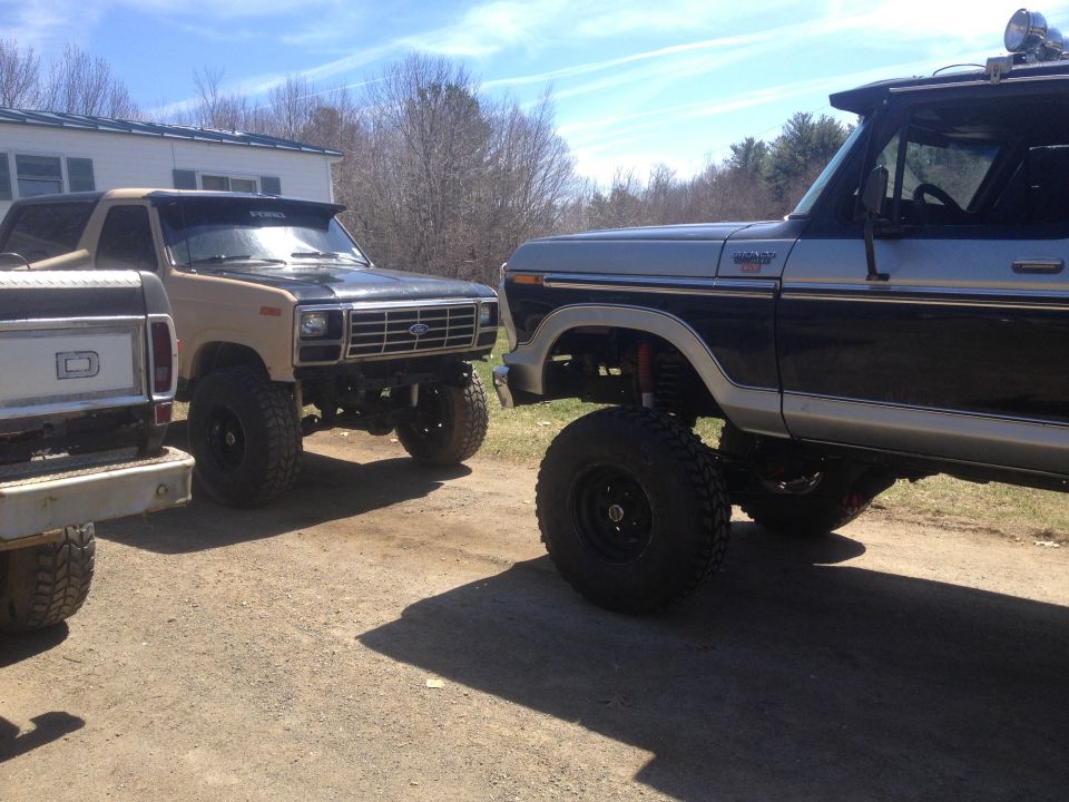 Tan and black 1979 Ford Bronco front 3/4 view, lifted
