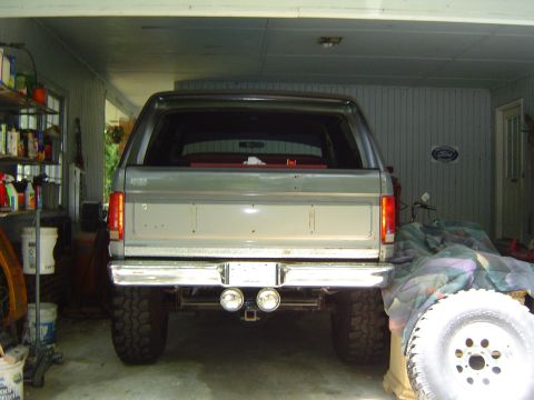 1986 Ford Bronco - This 1980s Ford Bronco is viewed from the rear, showing its dual exhaust and silver paint.