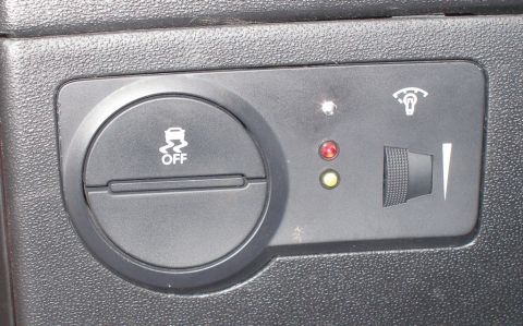 2010 Hyundai Genesis - Dashboard controls including the Electronic Stability Control OFF button and indicator lights.