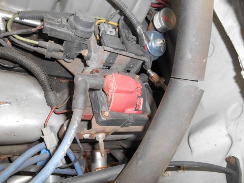 1994 Ford Bronco - Close-up view of engine components including an MSD ignition coil and spark plug wires.