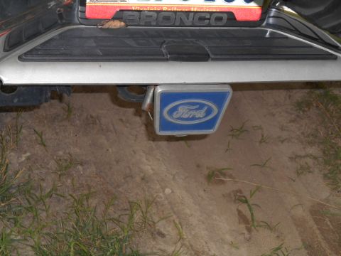 1994 Ford Bronco - Rear view of a Ford Bronco tailgate a Ford hitch cover.