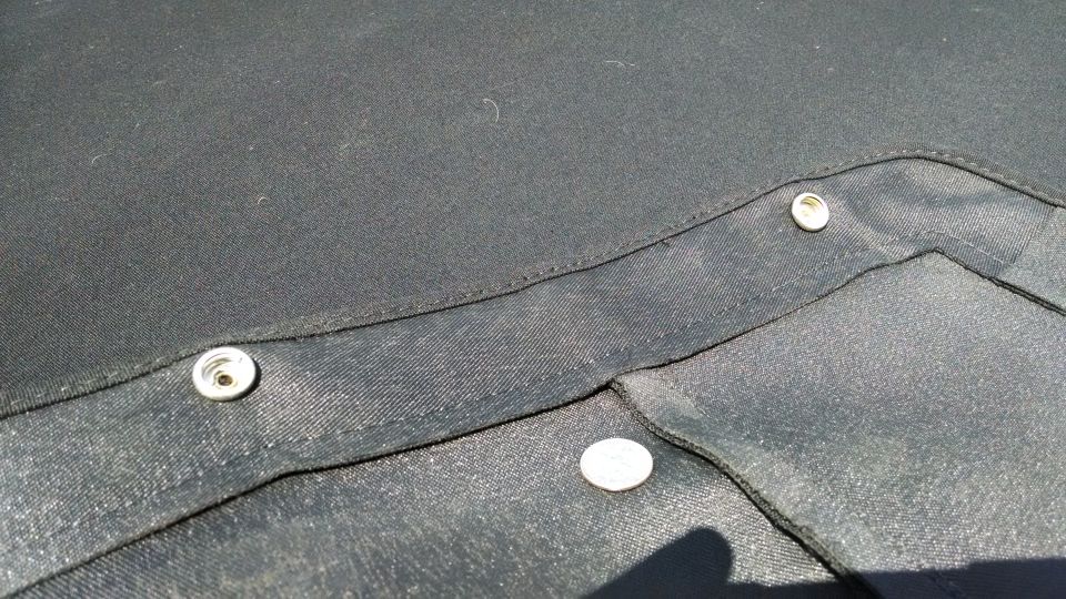 Black fabric top with snaps
