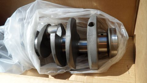 1972 Ford Ranchero - Crankshaft part shown in plastic packaging within a cardboard box.