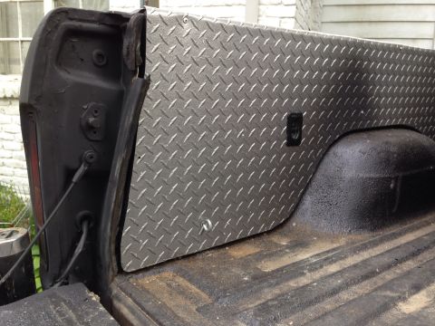 1979 Ford Bronco - Sprayed gray and added tie-down hooks