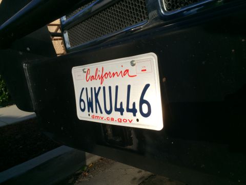 1997 Dodge 3500 - California license plate 6WKU446 is attached to the front bumper of a vehicle.