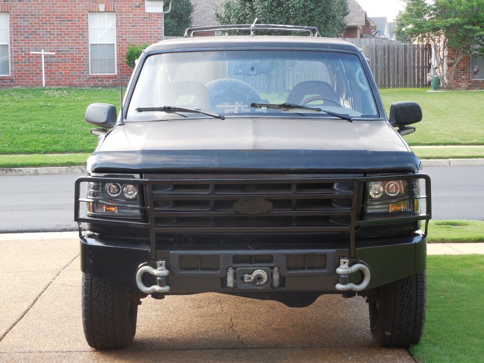 Black Ford Bronco front view with brush guard, winch bumper and D-ring shackles