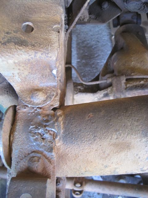 1946 Jeep Willys - This image shows heavily rusted frame and suspension components, with a "SuperMotors.net" watermark visible.
