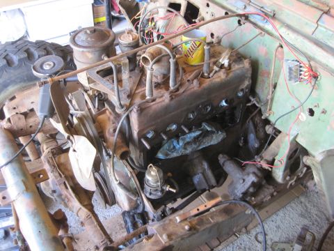 1946 Jeep Willys - Close-up view of an engine bay, showing the engine block and various components.
