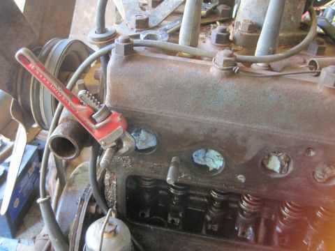 1946 Jeep Willys - Engine block detail with a pipe wrench in place.