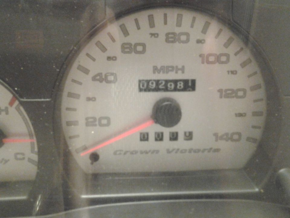 Crown Victoria speedometer cluster reading 92981 miles with 140 mph dial